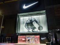 The front of the Nike Rise store featuring a huge image of a basketballer at the front at night.