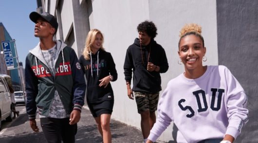 a group of diverse people wearing streetwear