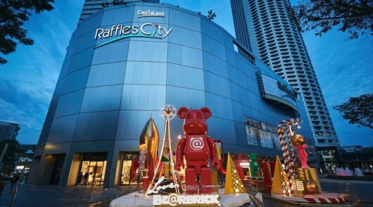 Raffles City’s facade featuring Bearbrick’s installation in 2021