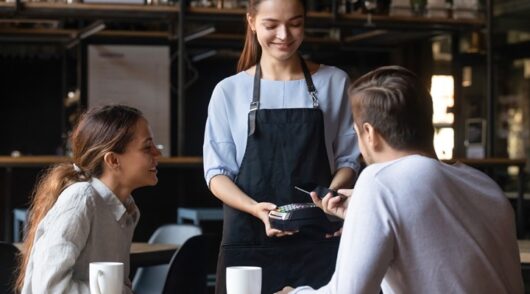 Client In Cafe Paying Using Mobile Application Nfc Payment