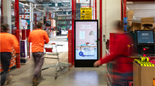 an image of an advertising screen at the entrance to a bunnings store