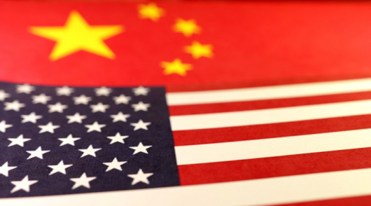 An image of the Chinese and US flags