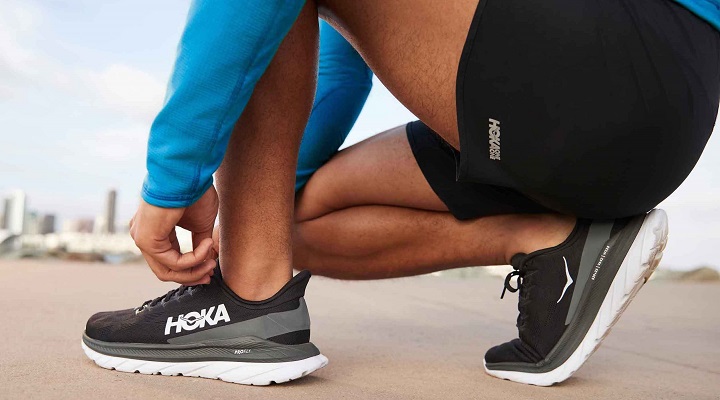 Hoka running shoes and shorts