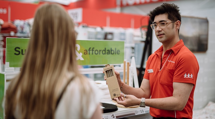 The Warehouse staff talks to a customer