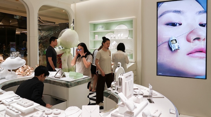 People visit a newly opened Popop store.