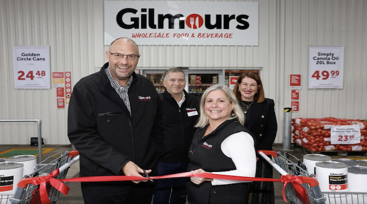 Image of people inaugurating new Gilmours store.