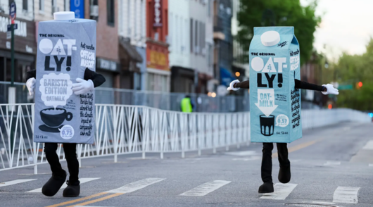 oatly mascots running the new york half-marathon