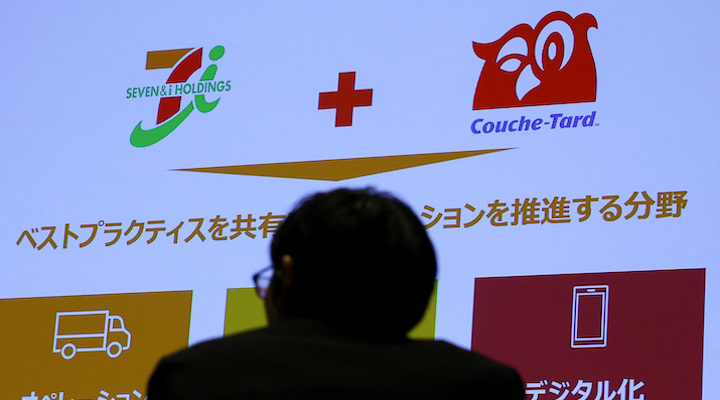 Image of man in front of display.