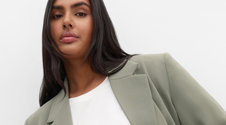 a model wears City Chic suit