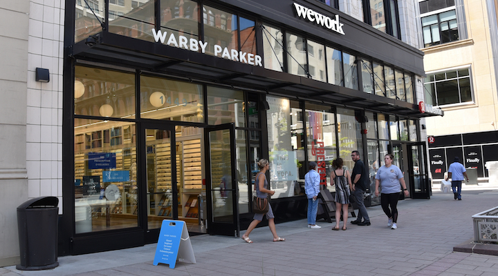 An exterior shot of a Warby Parker store in New York City.
