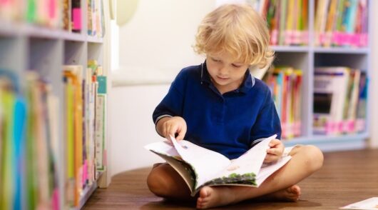 A child is reading book