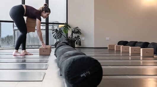 Image of woman in O-Studio yoga room.