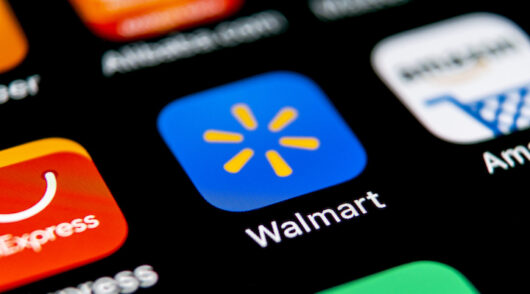 A close-up of a phone screen zoomed in on Walmart’s digital application.