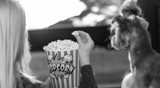 Woman eating popcorn