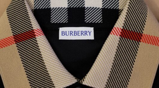 A Burberry Check styled shirt with the Burberry label is displayed at the Burberry flagship store