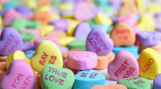 Image of candy hearts with messages on them