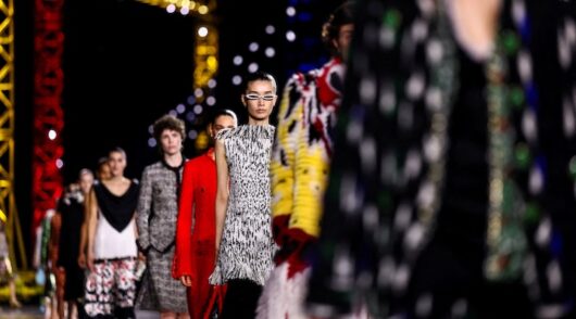 Models present creations by designer Matthieu Blazy