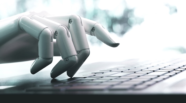 Robot concept or robot hand chatbot pressing computer keyboard