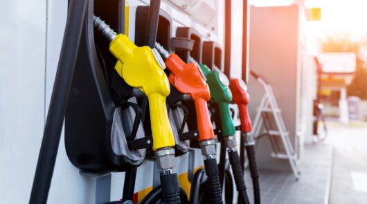 fuel nozzles at gas station