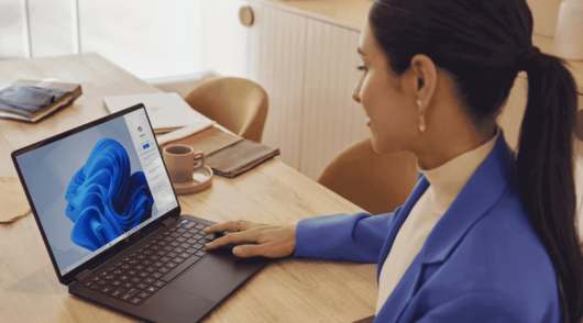 a woman uses HP laptop
