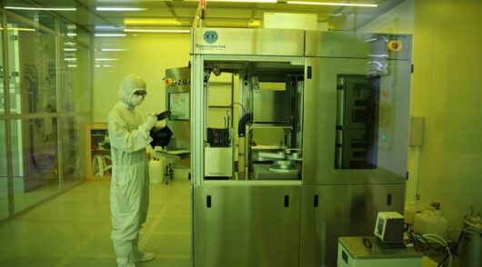 Semiconductor worker in chip facility.