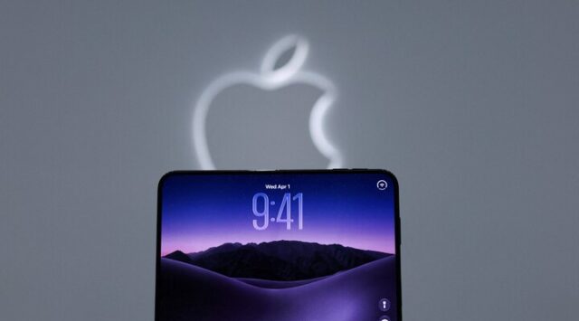 Apple device beneath the company logo.