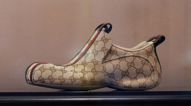 Gucci Drip sneaker on display.